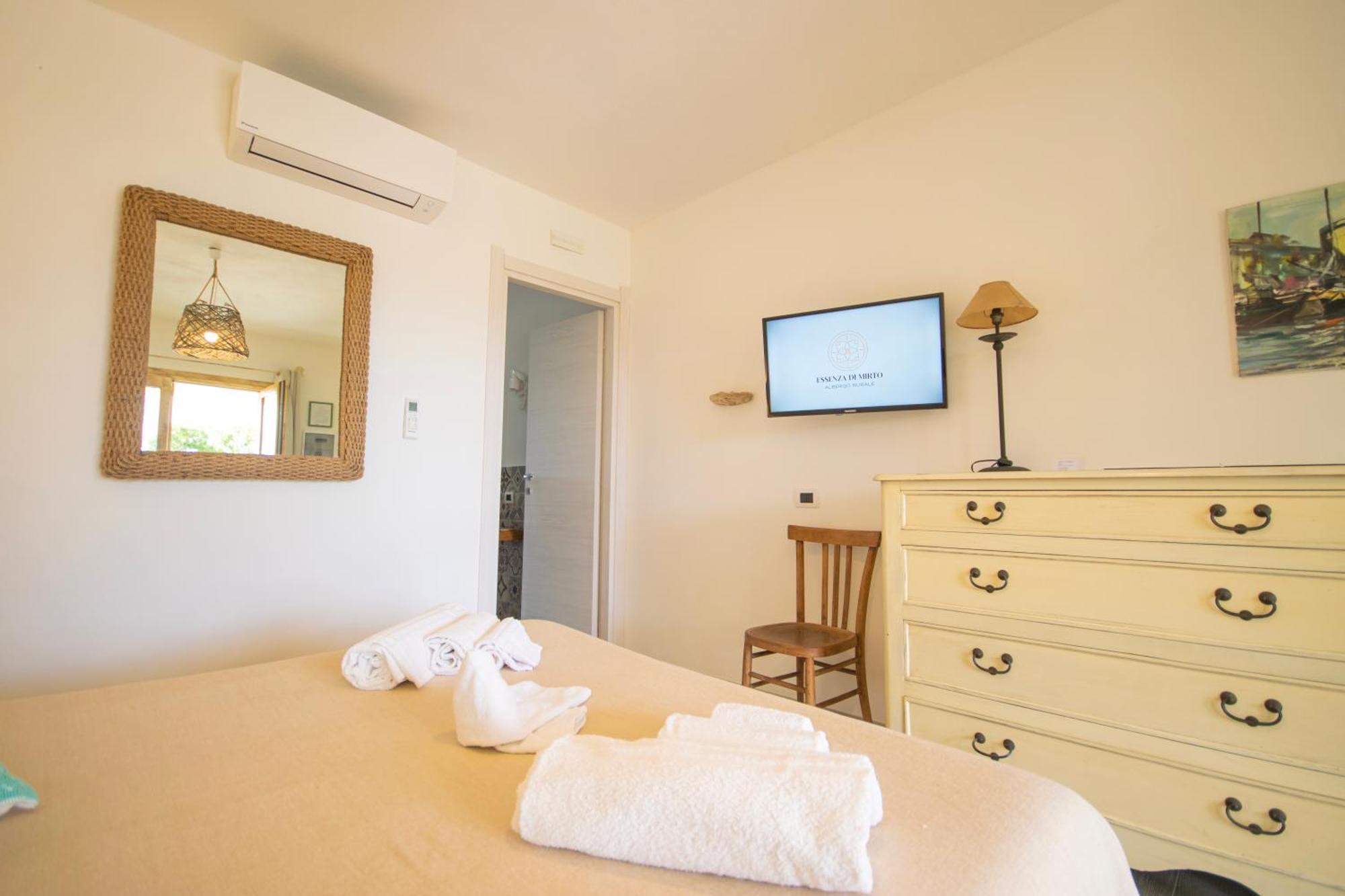 Hotel Essenza Di Mirto La Caletta Extérieur photo