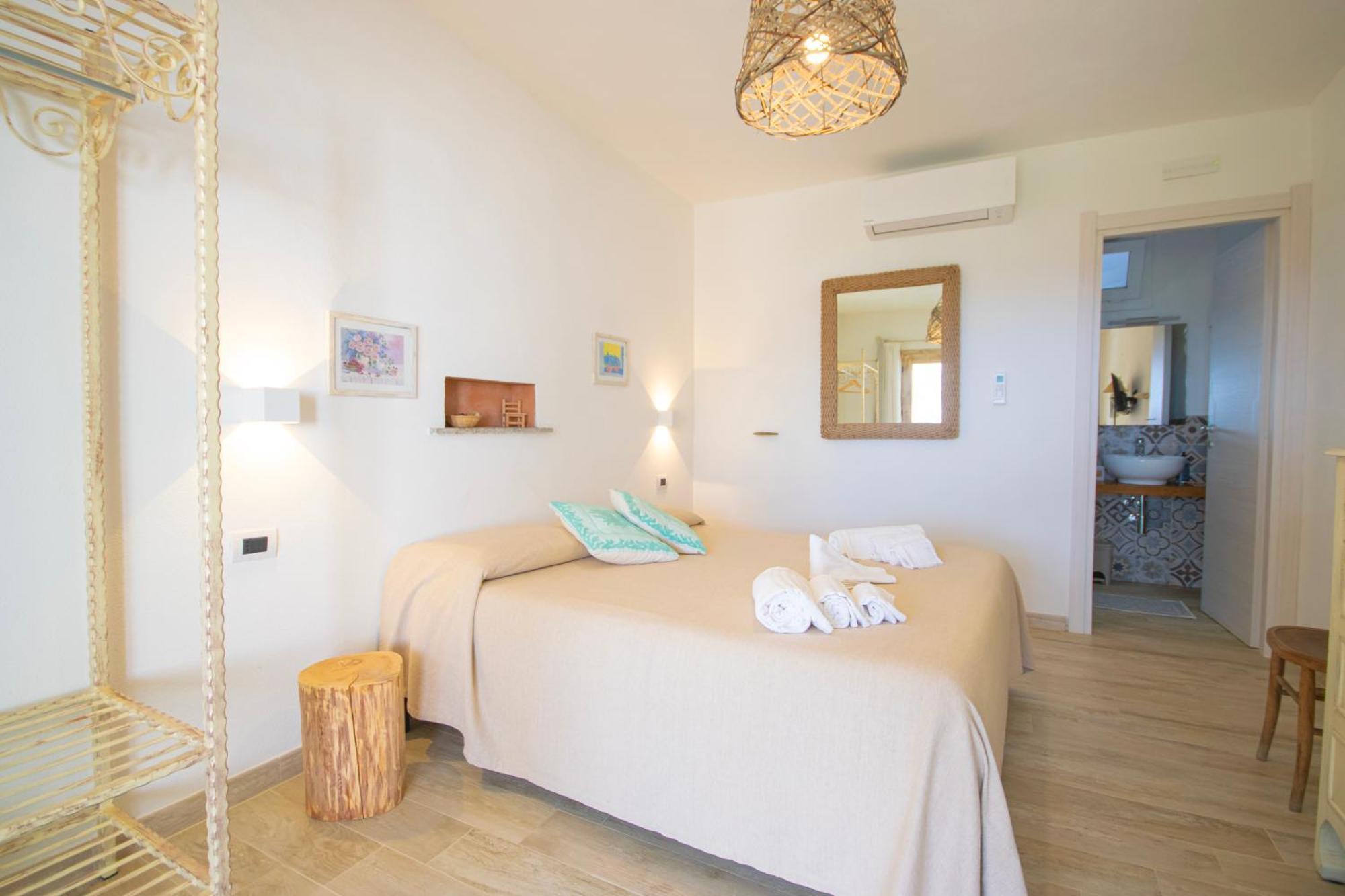 Hotel Essenza Di Mirto La Caletta Chambre photo