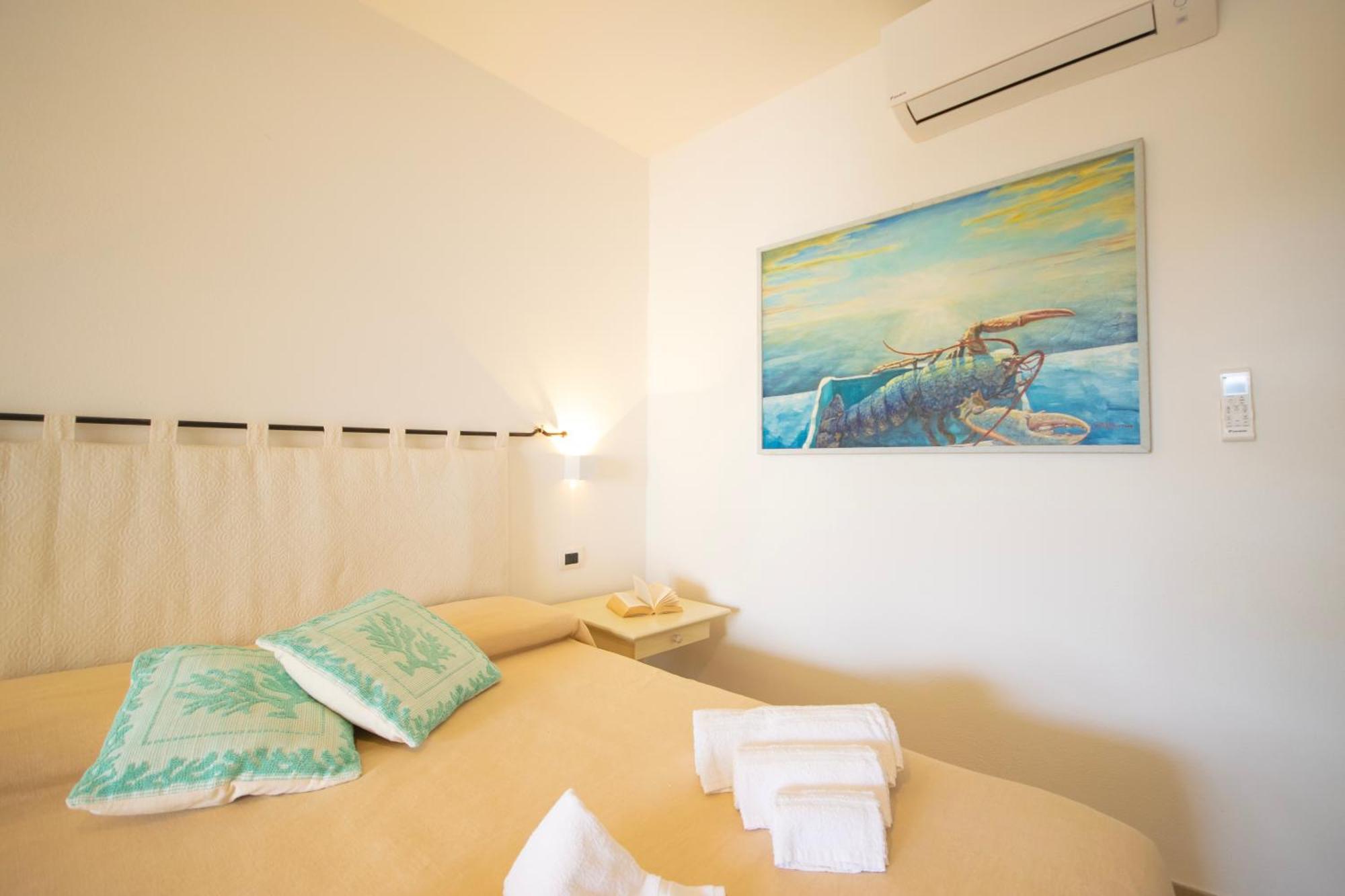 Hotel Essenza Di Mirto La Caletta Extérieur photo