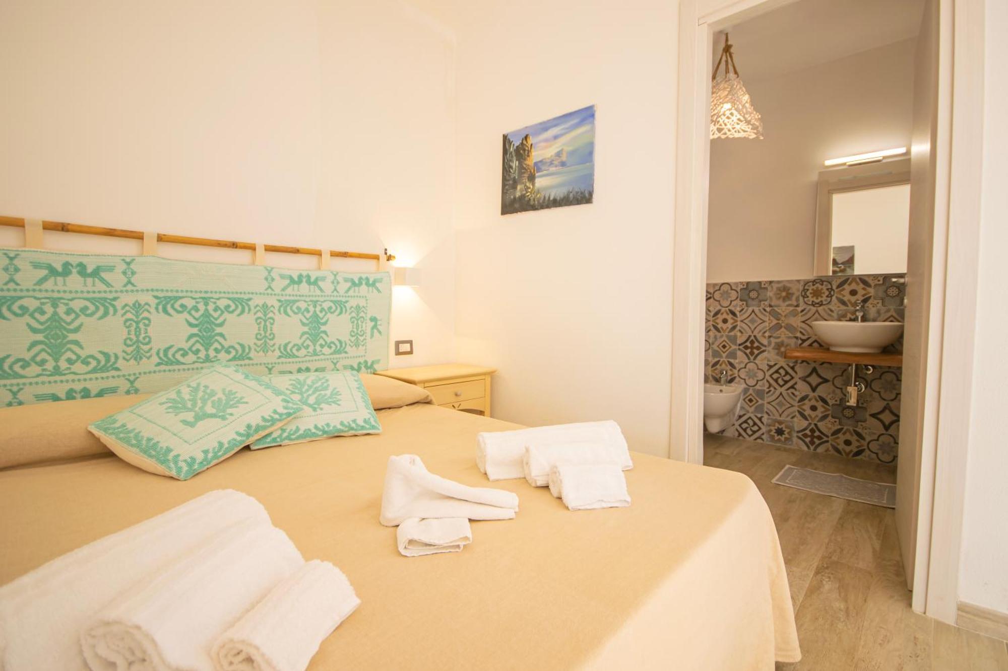 Hotel Essenza Di Mirto La Caletta Chambre photo